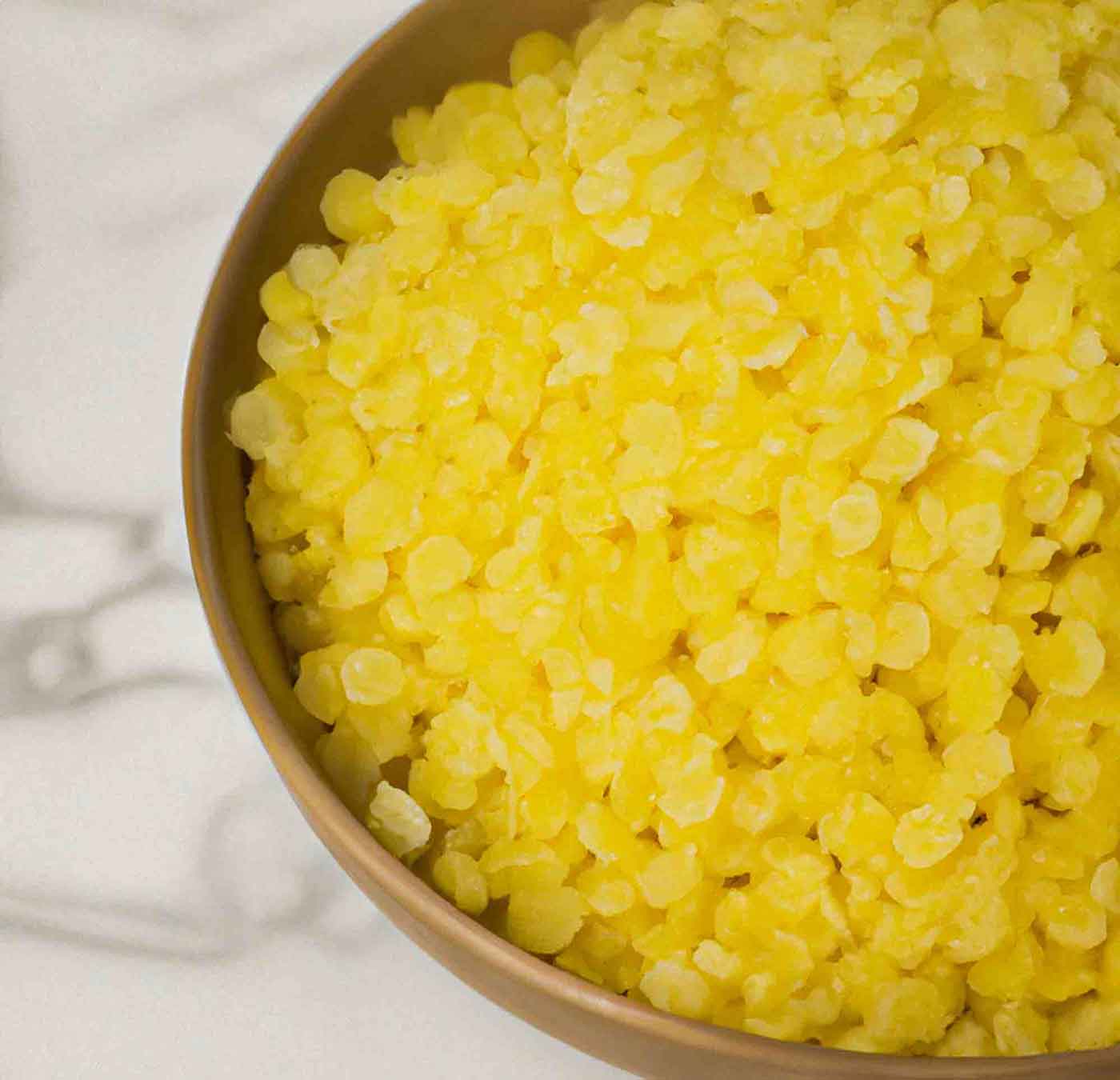 Organic yellow beeswax, the wax that forms the protective barrier in our lip balm